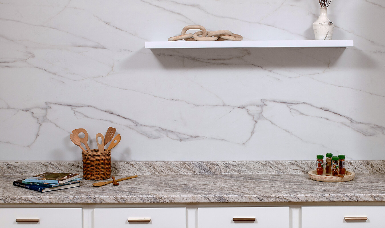 Granito Casacata Countertops With Calacatta Lincoln Wall Backsplash